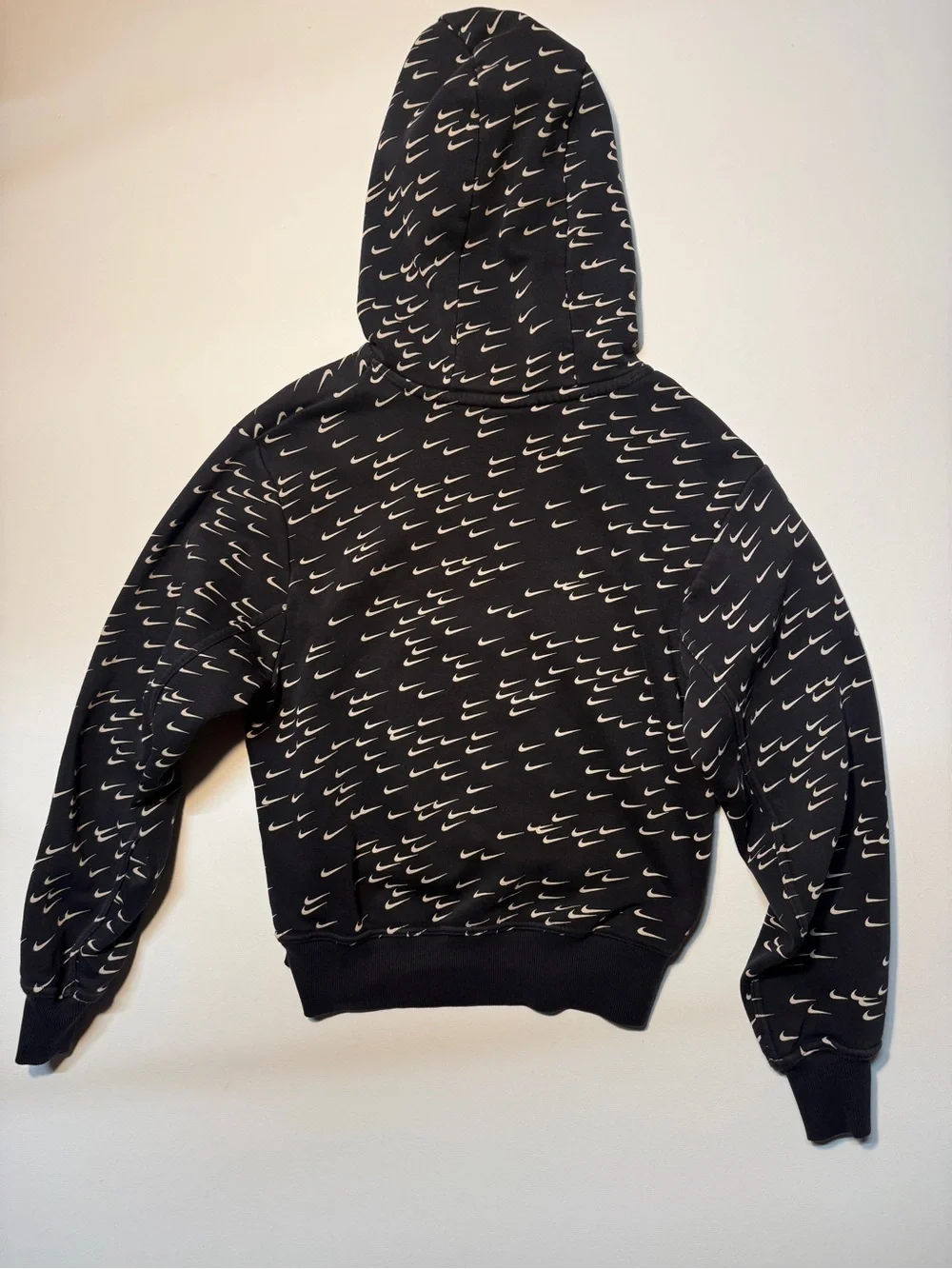 Nike‎ Black Hoodie with Repeating White Swoosh Print
